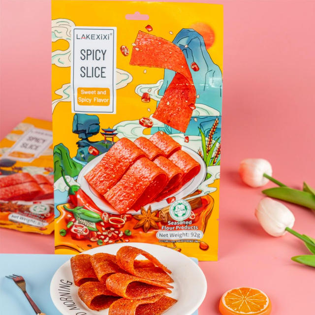 Close-up of Traditional Sweet Spicy Slice texture - chewy grain snack, Sweet Spicy flavor, vacuum-packed	